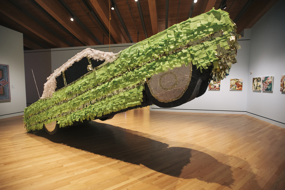 Lowrider Piñata. 2014. Cardboard, Paper, glue. 5'x19.5'x6.5'. Photo: Mikayla Whitmore